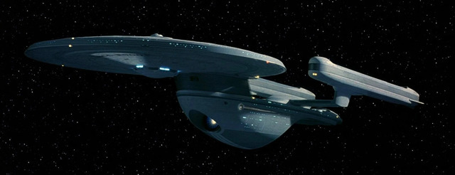 A screen capture of the fictional Star Trek ship class "Excelsior", against a starred space background.