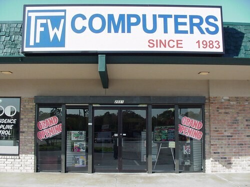 a store called TFW Computers. Sign says "Since 1983"