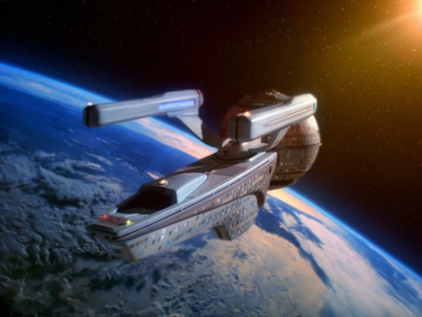 A screen capture of the fictional Star Trek ship class "Olympic", orbiting Earth.