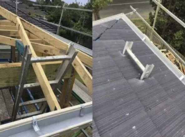 Left panel: construction site - near the roof a piece of wood is bolted through the top rung of a ladder so the ladder can't be taken out without the wood beam removed.

Right panel: completed rood with a few inches of the ladder (which wasn't removed) sticking out the top of the roof.